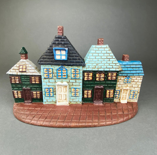 Vintage Cast Iron Door Stopper Shaped like Row of Houses