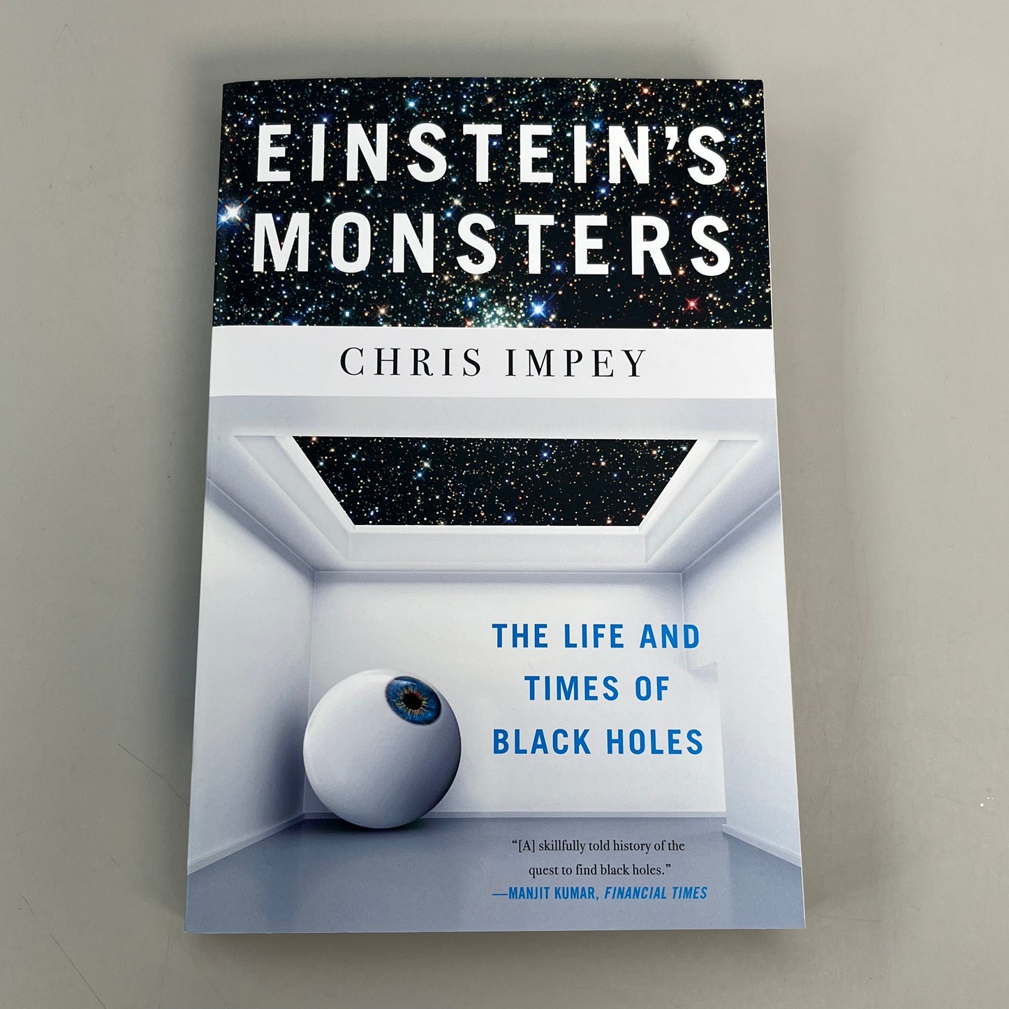 Einstein's Monsters: The Life and Times of Black Holes Chris Impey 8" x 5.5" Paperback (New)