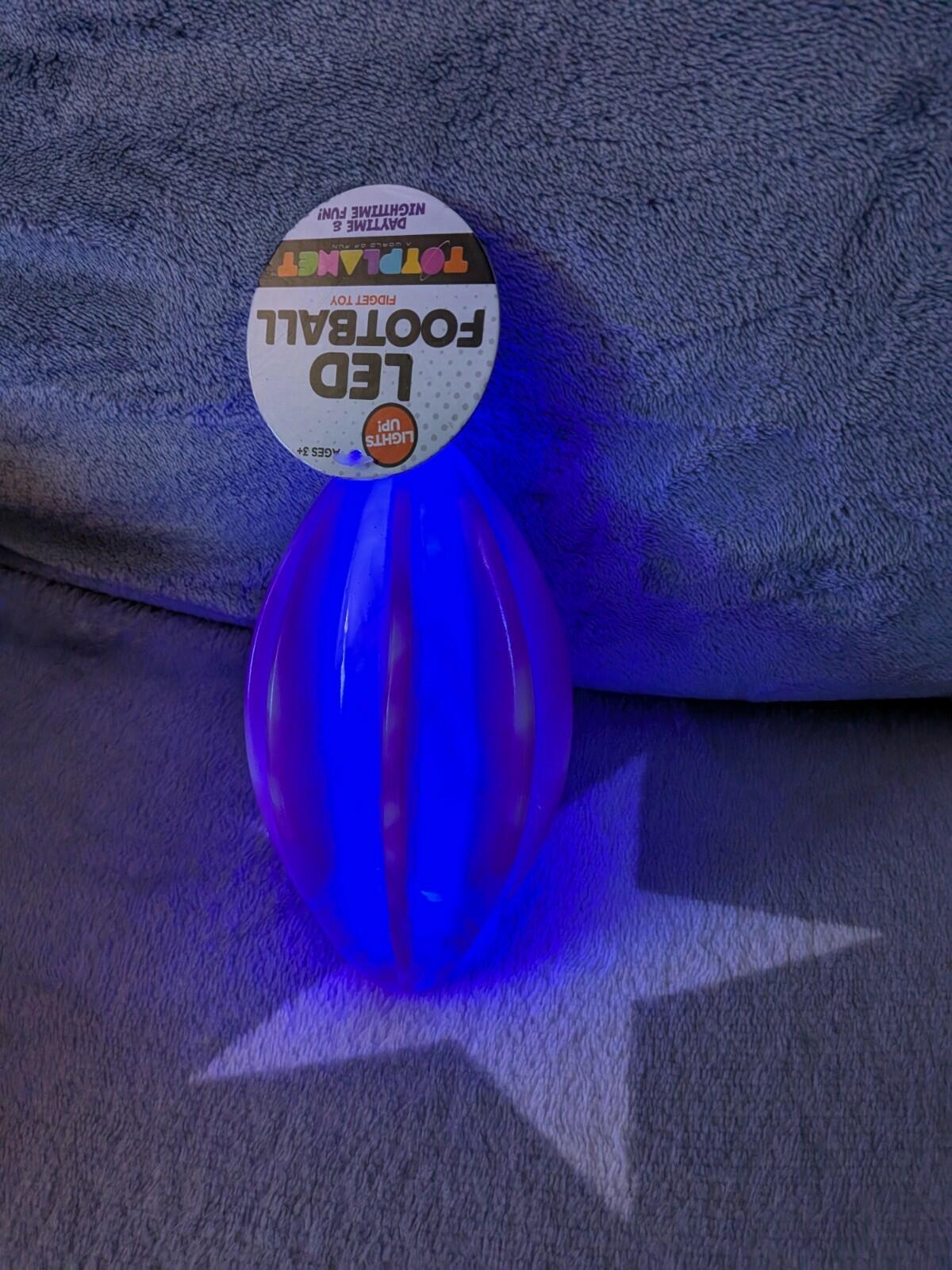 LED Football Toy Planet Fidget Toy Purple Swirl 6" x 3.25"
