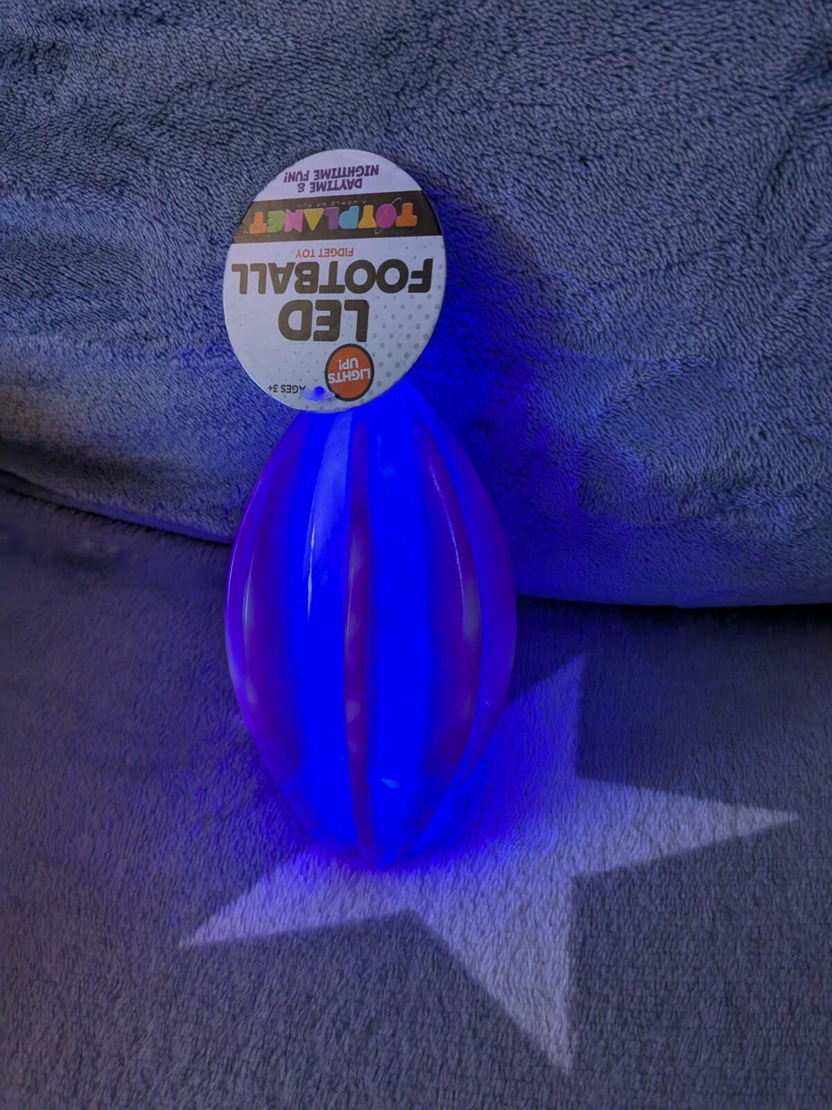 LED Football Toy Planet Fidget Toy Purple Swirl 6" x 3.25"